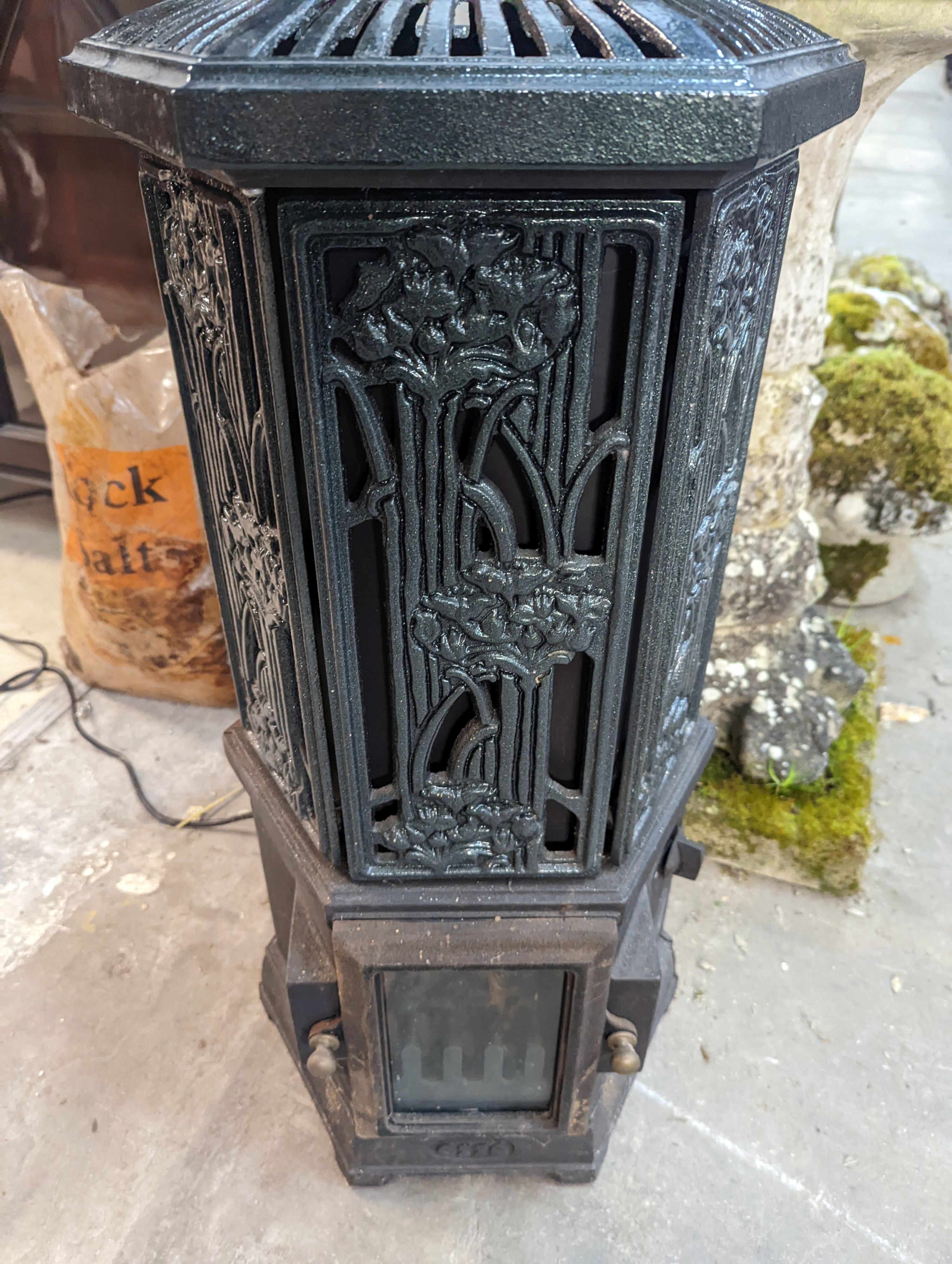 A Victorian style Esse Firemaster Solo hexagonal electric cast iron framed conservatory heater, height 76cm